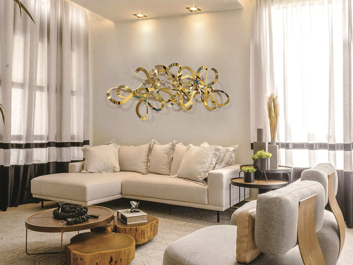 Escultura de pared Medusa acero dorado