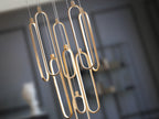 Lámpara de techo Colette 9 luces oro rosa