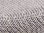 Sillón de comedor Unzué en tela repelente al agua
