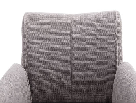 Sillón de comedor Unzué en tela repelente al agua