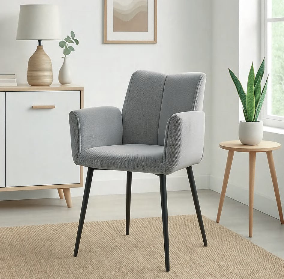 Sillón de comedor Unzué en tela repelente al agua